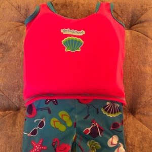 One piece swimwear with float attached